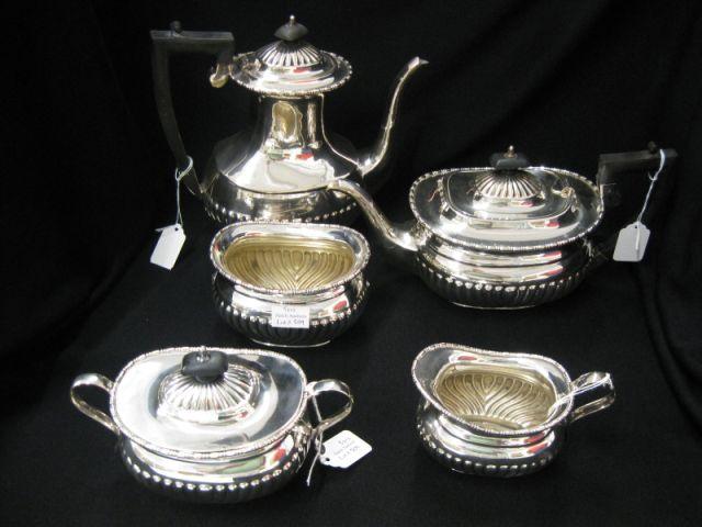 Appraisal: pc Sheffield Silverplate Tea Coffee Service ribbed decor ebony handles