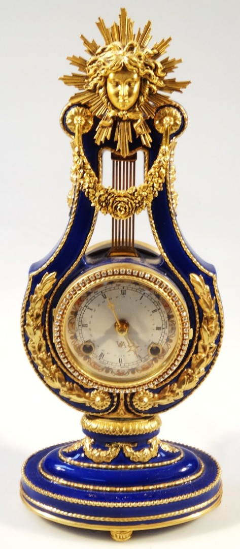 Appraisal: A fine porcelain copy of the Marie Antoinette clock in