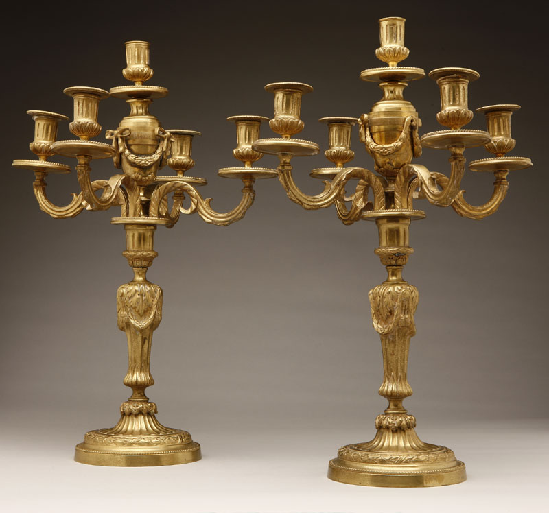 Appraisal: A pair of Louis XVI style gilt-bronze five-light candelabra A