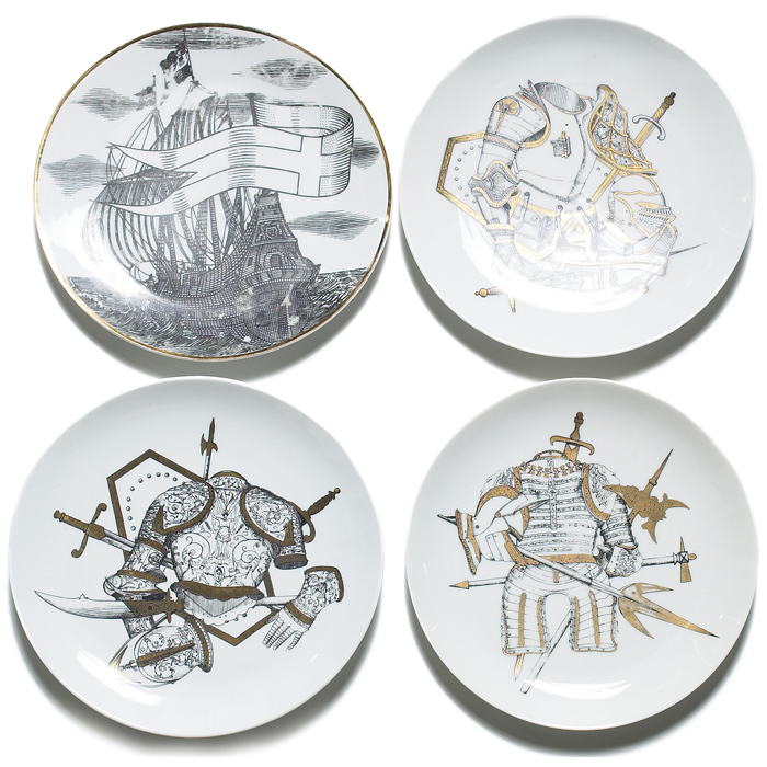 Appraisal: Fornasetti Armature plates three elaborate designs in black and gold