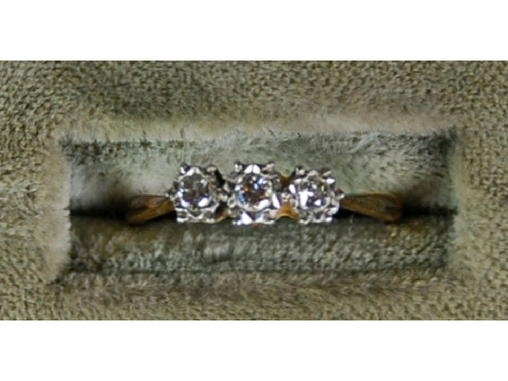 Appraisal: ct GOLD AND PLATINUM RING with three diamonds in illusion