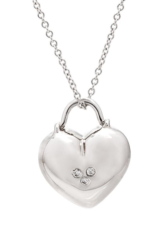 Appraisal: Sale Lot An Karat White Gold and Diamond Heart Pendant