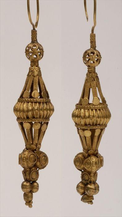 Appraisal: PAIR OF ANCIENT PERSIAN-STYLE EARRINGS ORNAMENTS damaged in Provenance Property