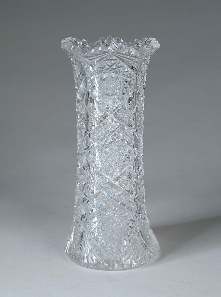 Appraisal: CUT GLASS VASE Heavily cut hobstar and cane pattern with