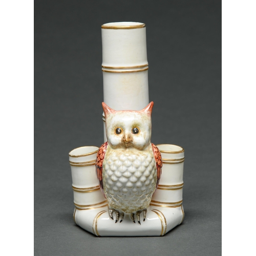 Appraisal: A Royal Worcester Owl and Bamboo flower holder on horseshoe