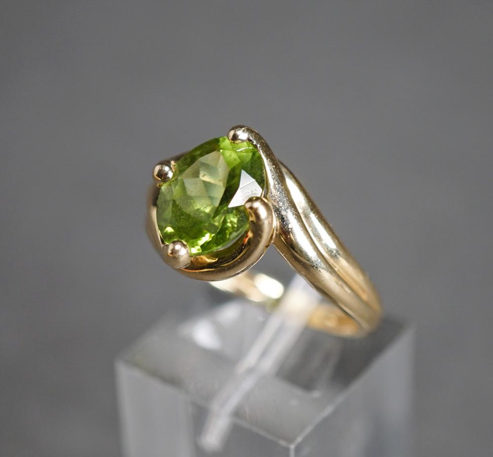 Appraisal: -KARAT YELLOW-GOLD AND PERIDOT RING GROSS DWT SIZE -Karat Yellow-Gold