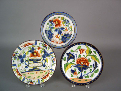 Appraisal: Three Gaudy Dutch plates th c in the urn grape