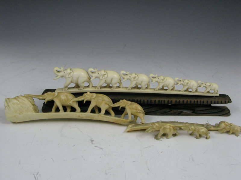 Appraisal: Antique Ivory Elephant Procession carved ivory on fitted base another