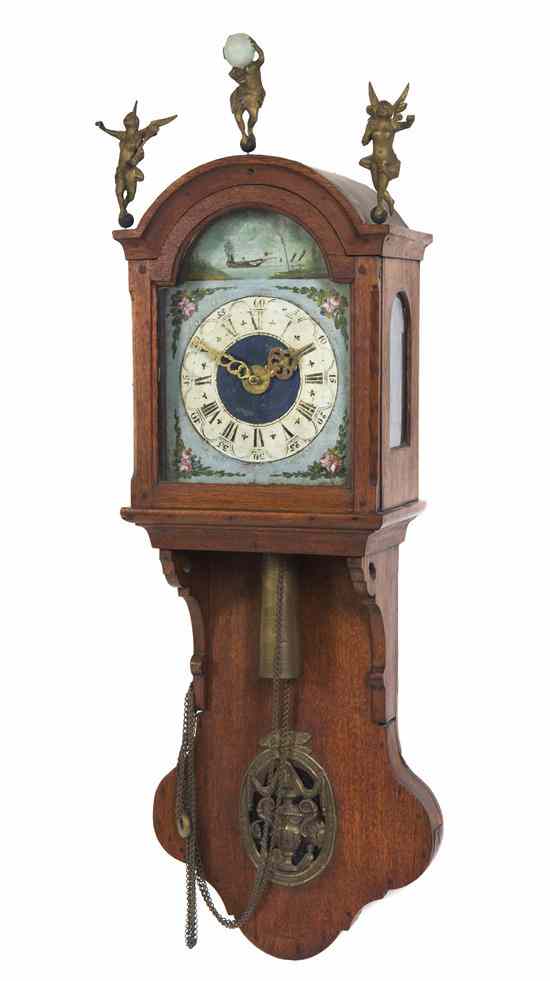 Appraisal: A Dutch Wall Clock the domed case surmounted with a