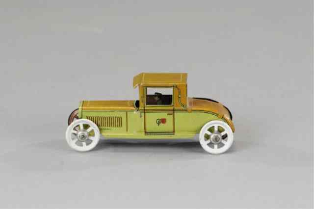 Appraisal: FISCHER PENNY TOY Germany litho tin auto painted in green