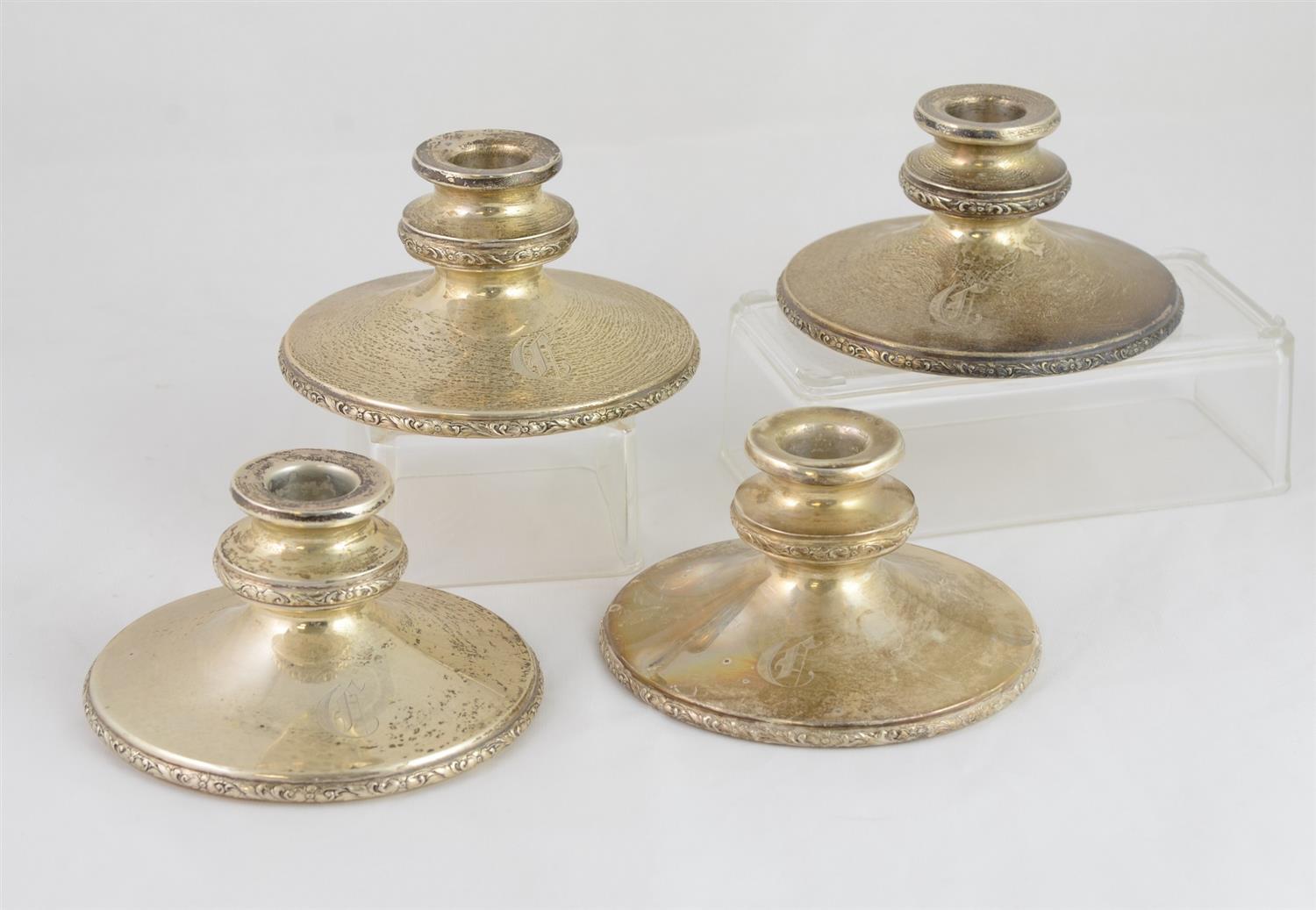 Appraisal: International weighted sterling silver candleholders base marked N - dia