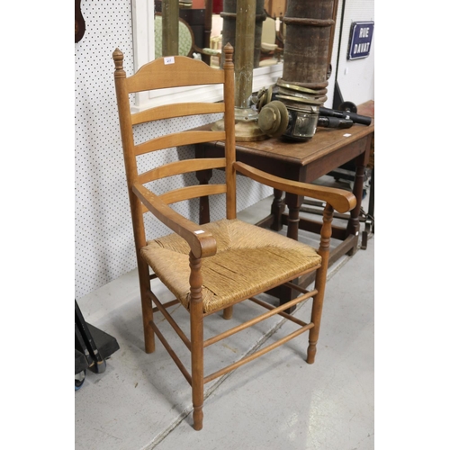 Appraisal: Single wooden armchair with rattan seat