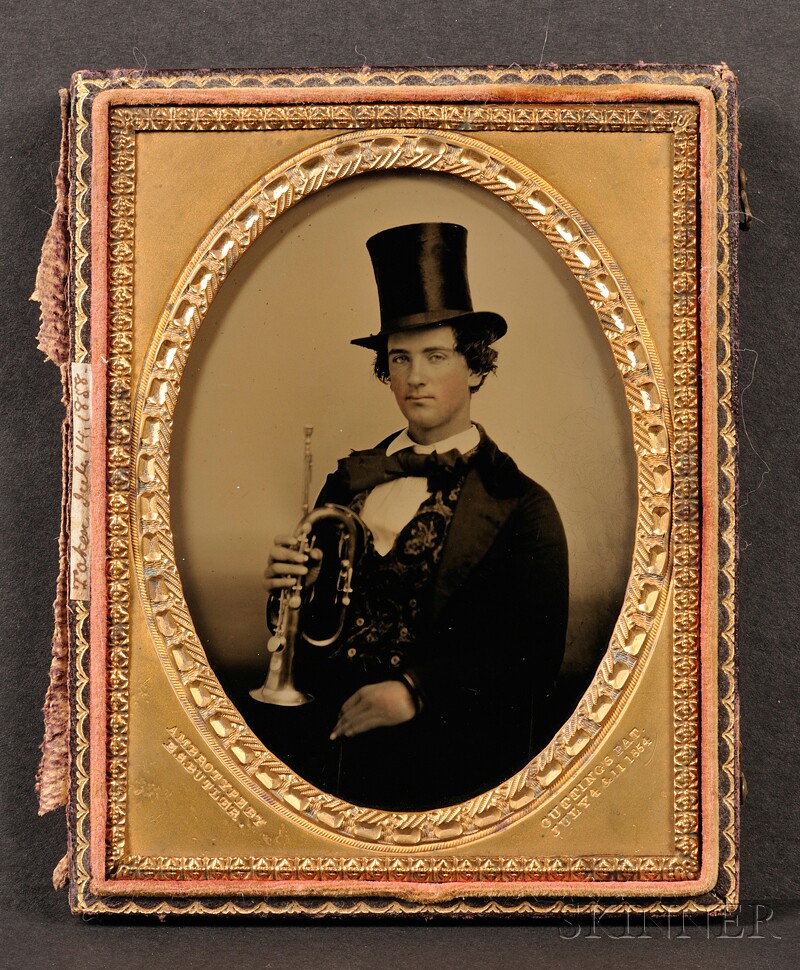 Appraisal: Quarter Plate Ambrotype Portrait of a Young Man Seated with