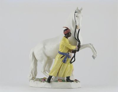 Appraisal: A Meissen model of a rearing horse with a blackamoor