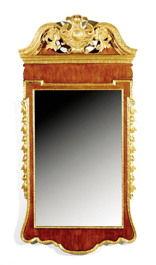 Appraisal: Chippendale style giltwood and mahogany mirror Colonial Williamsburg broken arch