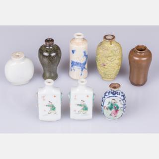 Appraisal: A Collection of Eight Chinese Porcelain and Stoneware Snuff Bottles