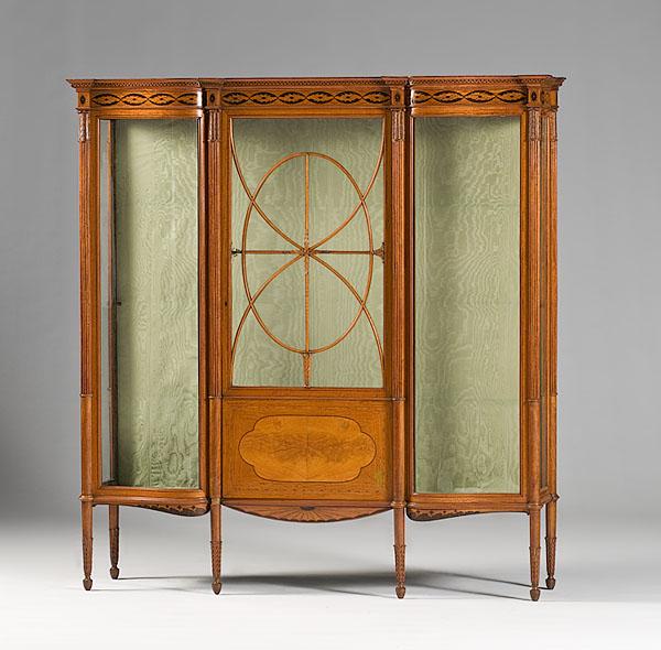 Appraisal: EDWARDIAN SATINWOOD CABINET English ca - satinwood tripartite serpentine breakfront