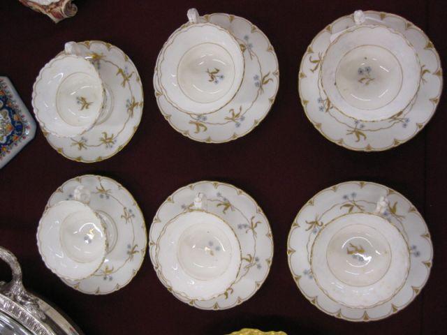 Appraisal: Set of Handpainted China Cups Saucers fine floral and gold