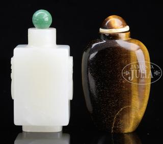 Appraisal: TWO CARVED SNUFF BOTTLES th century China Carved Jade snuff