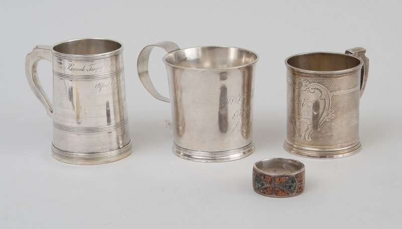 Appraisal: THREE AMERICAN SILVER MUGS One stamped twice 'Channers' with everted