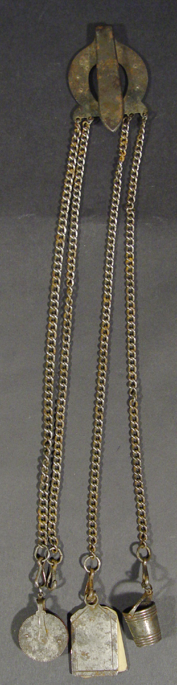 Appraisal: th century cut steel chatelaine fitted with three accessories mounted