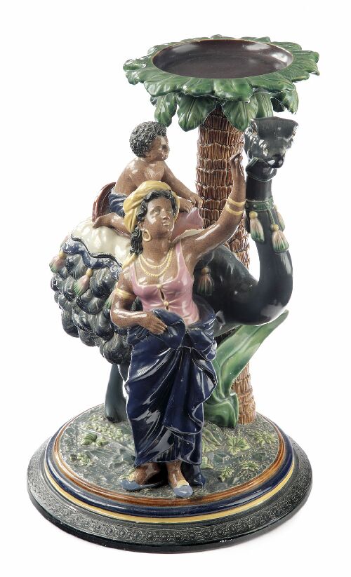 Appraisal: A th century continental majolica figural stand modelled as an