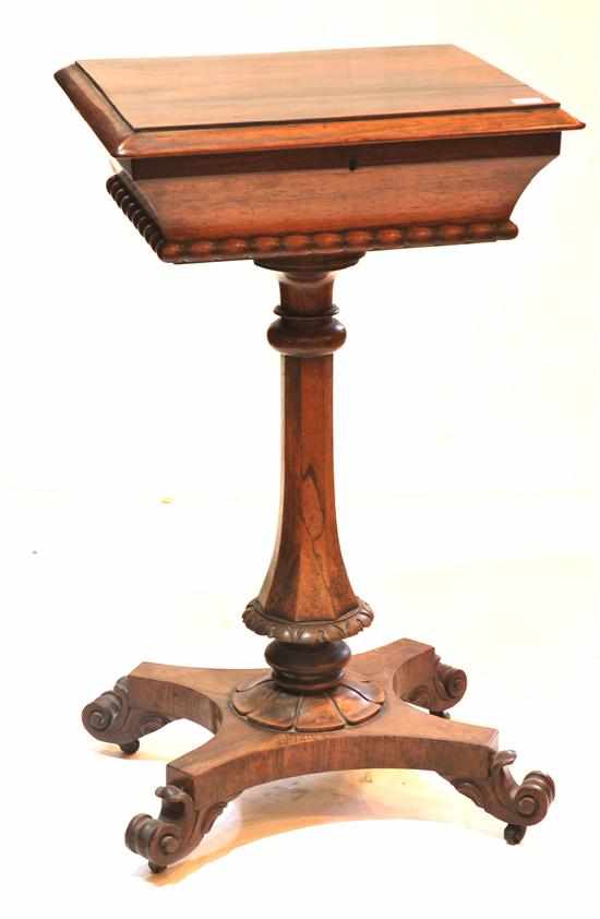 Appraisal: A Victorian rosewood teapoy Circa The hinged rectangular top opening