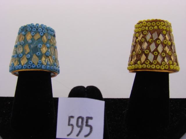 Appraisal: Lot of sequin decorated large thimbles one yellow one blue