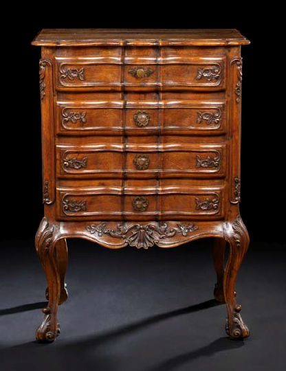 Appraisal: Louis XV-Style Provincial Oak Commode the rectangular top with a