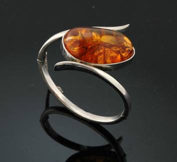 Appraisal: A sterling silver and amber bangle by Hardy Bros The