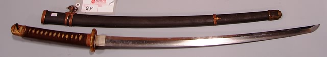 Appraisal: Lot consists of a WWII period Japanese officers Samari sword