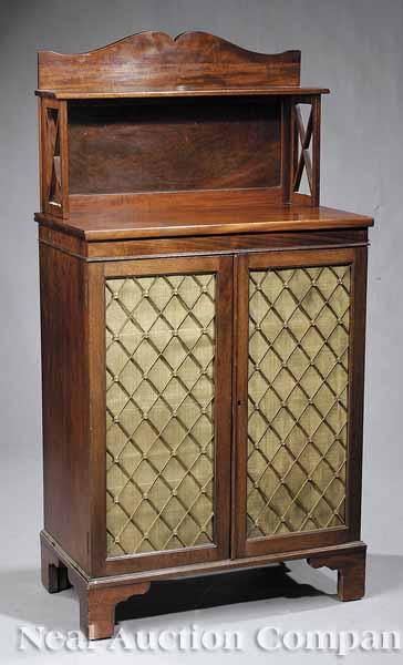 Appraisal: An Antique George III-Style Mahogany Chiffonnier serpentine shelved backsplash over