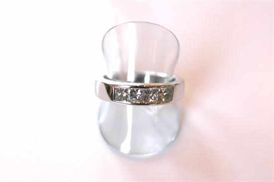 Appraisal: A FOUR STONE PRINCESS CUT DIAMOND SET DRESS RING IN