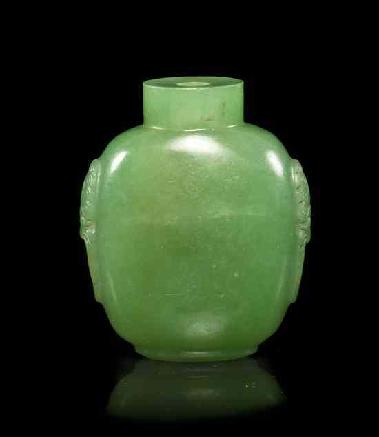 Appraisal: A Carved Jadeite Snuff Bottle of a bright apple green