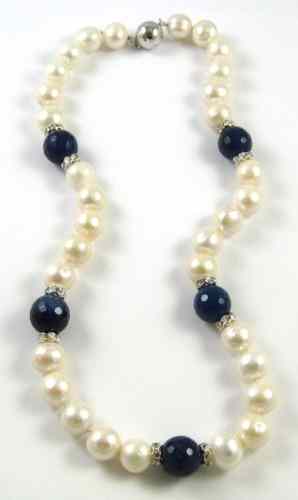 Appraisal: MATINEE LENGTH PEARL NECKLACE with faux diamonds and strung with