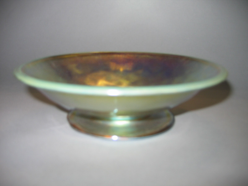 Appraisal: L C T FAVRILE Gold iridescent shallow bowl on ring