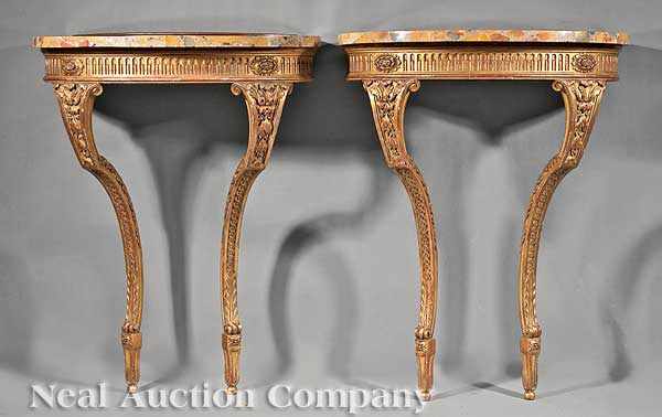 Appraisal: A Pair of Louis XVI-Style Carved Giltwood Console Jardini res