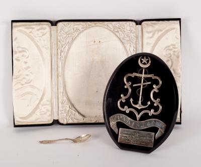 Appraisal: Naval Interest A presentation plaque with easel back applied with