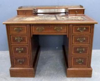 Appraisal: th century satin wood and cross banded knee hole desk