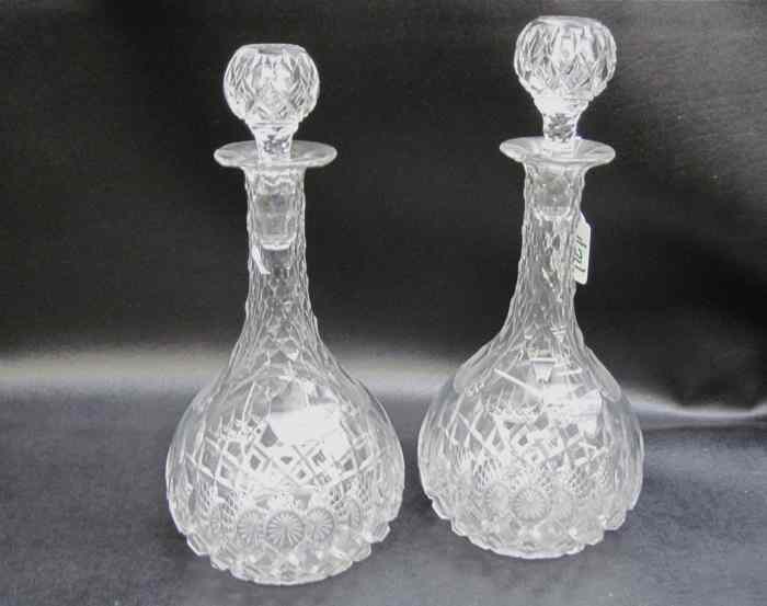 Appraisal: SET OF TWO CUT CRYSTAL DECANTERS clear matching patterns one