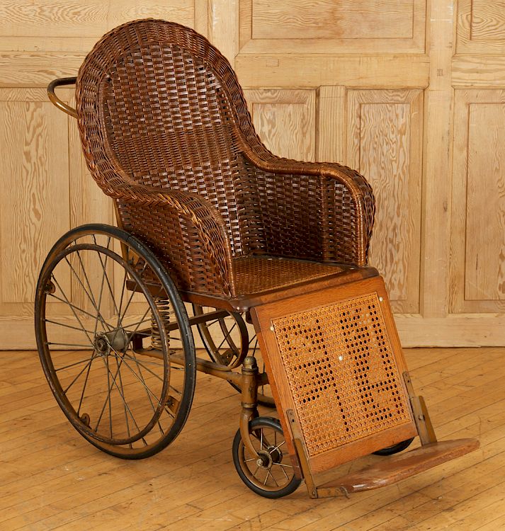 Appraisal: OAK AND WICKER TH CENTURY INVALIDS CHAIR An oak and