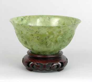 Appraisal: A Carved Jade Bowl Chinese A carved jade footed bowl