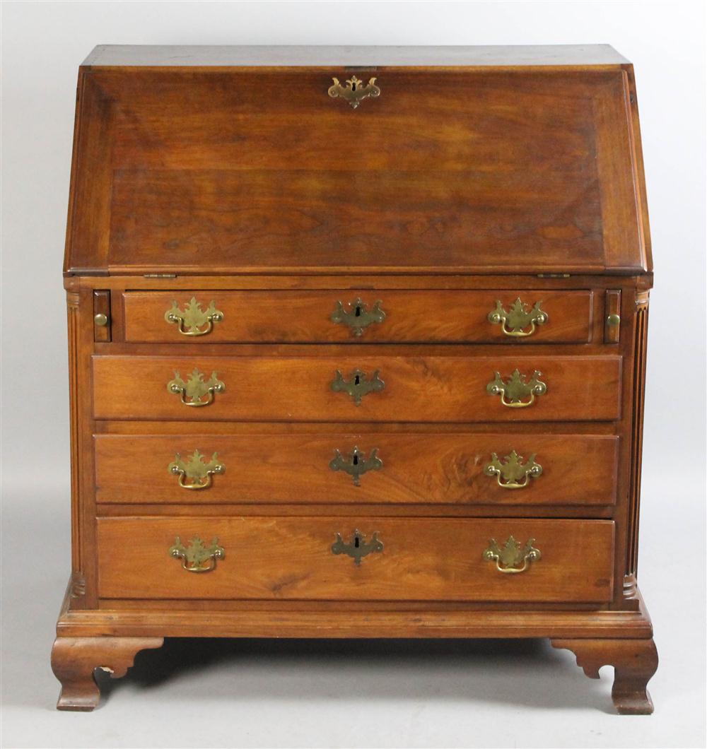 Appraisal: PENNSYLVANIA CHIPPENDALE WALNUT SLANT-FRONT DESK having a rectangular top over