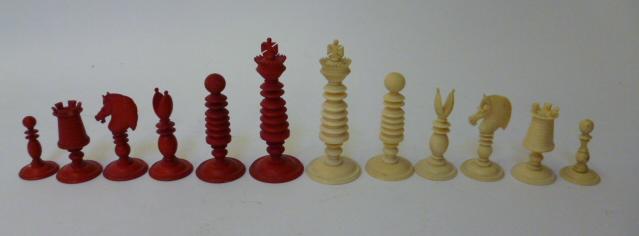 Appraisal: A NATURAL AND RED STAINED IVORY BARLEYCORN TYPE CHESS SET