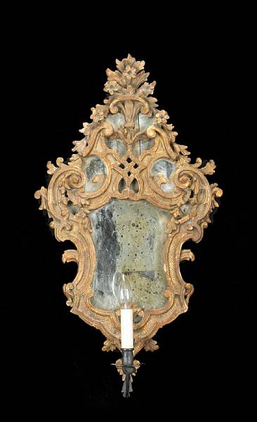 Appraisal: A pair of Italian Rococo giltwood girandole mirrors second quarter