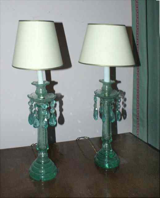 Appraisal: A PAIR OF GREEN GLASS CANDLESTICKS etched with fruiting vines