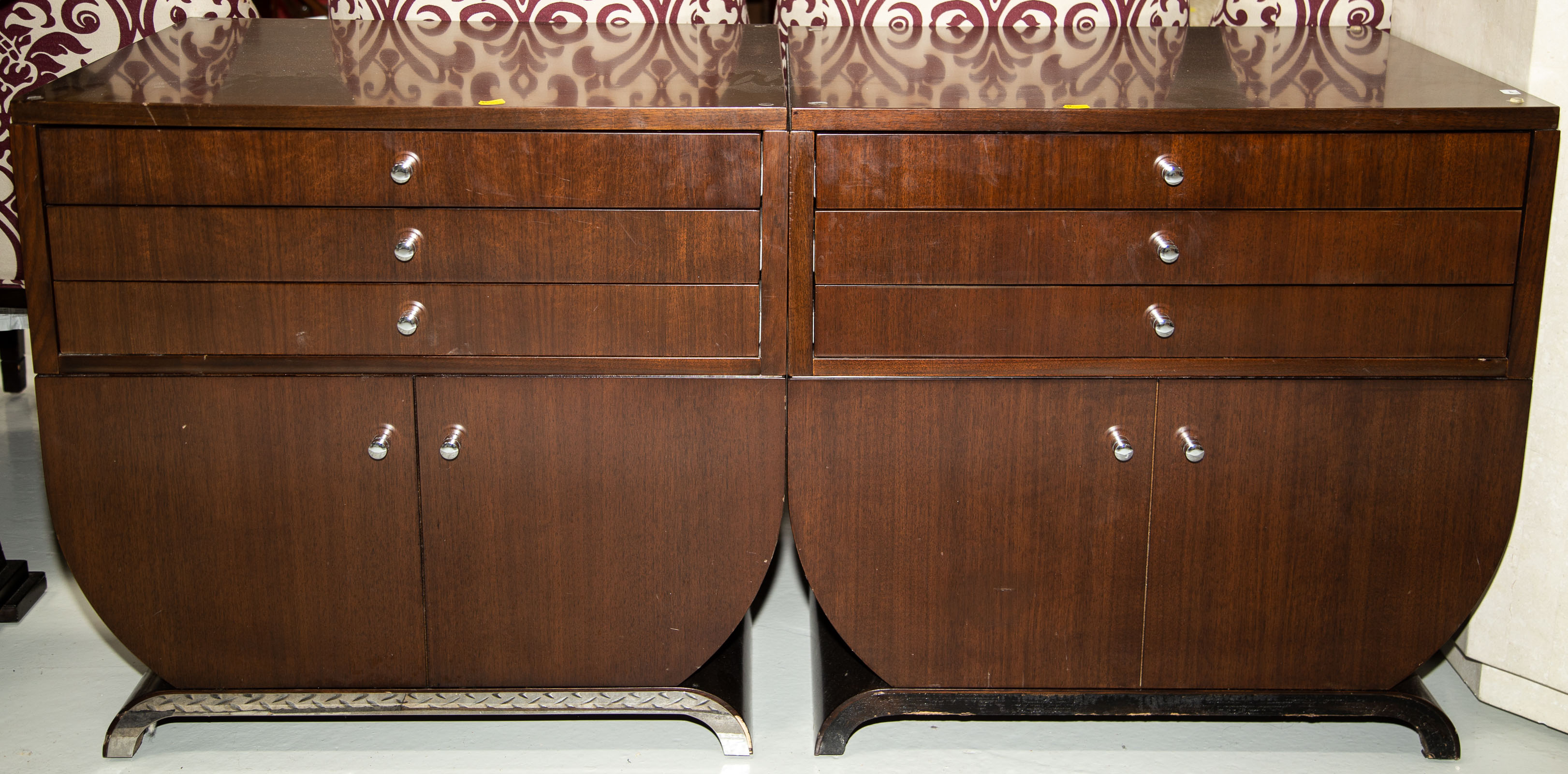 Appraisal: A PAIR OF ART DECO STYLE BEDSIDE CHESTS Modern mahogany