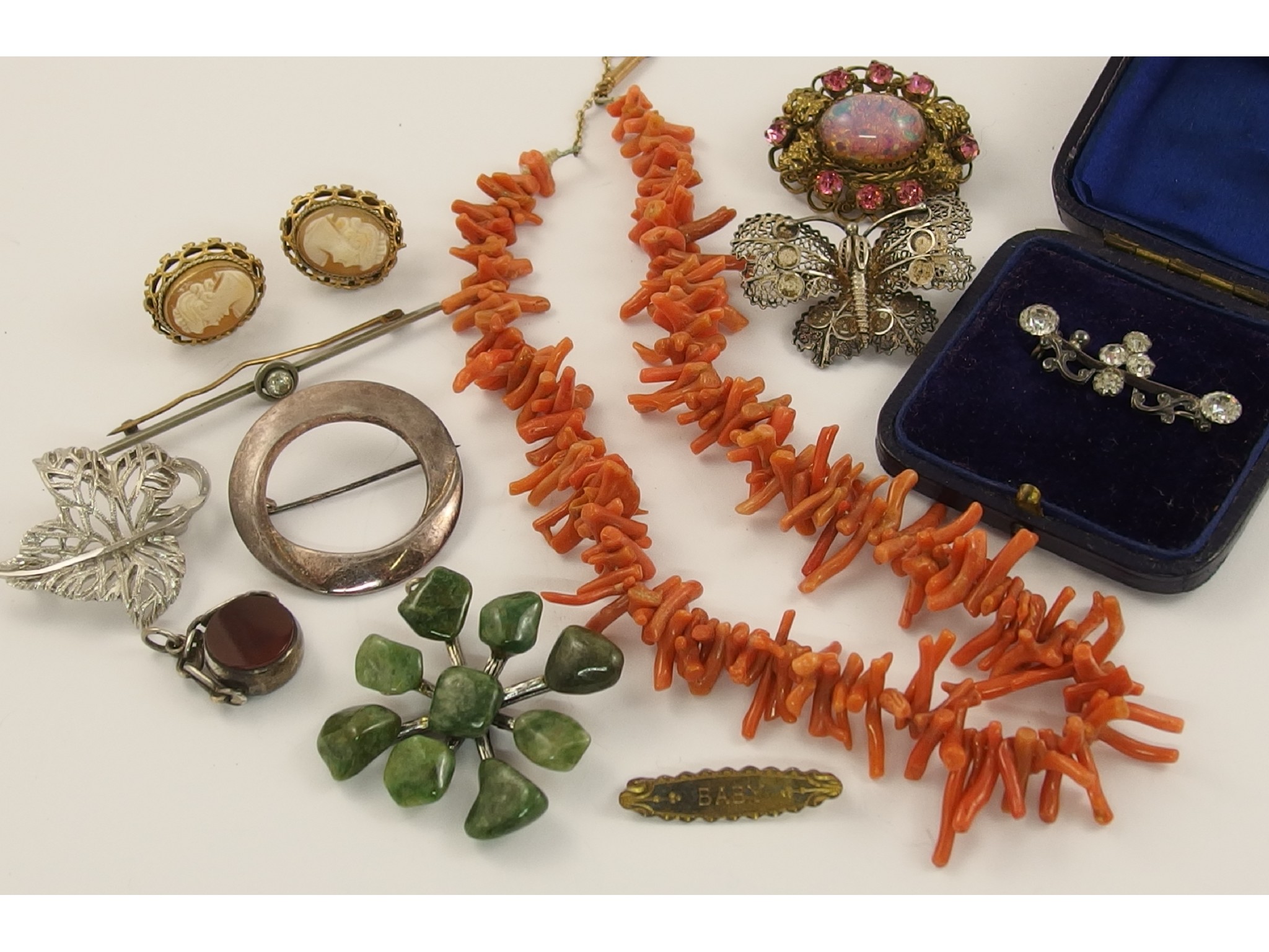 Appraisal: A coral necklace and a collection of silver and costume