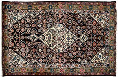 Appraisal: Hamadan rug central serrated ivory diamond on dark blue field