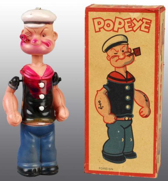 Appraisal: Celluloid Popeye Wind-Up Toy in Original Box Description Japanese Circa